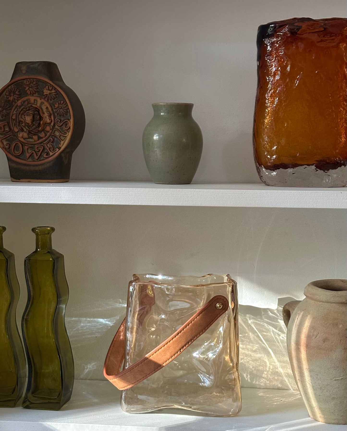 Sculpted glass bag vase