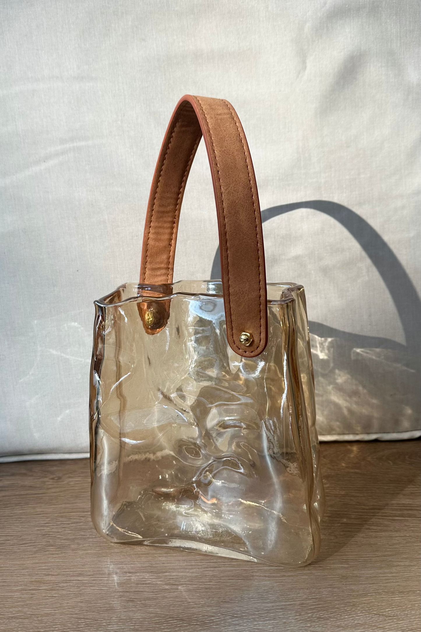 Sculpted glass bag vase