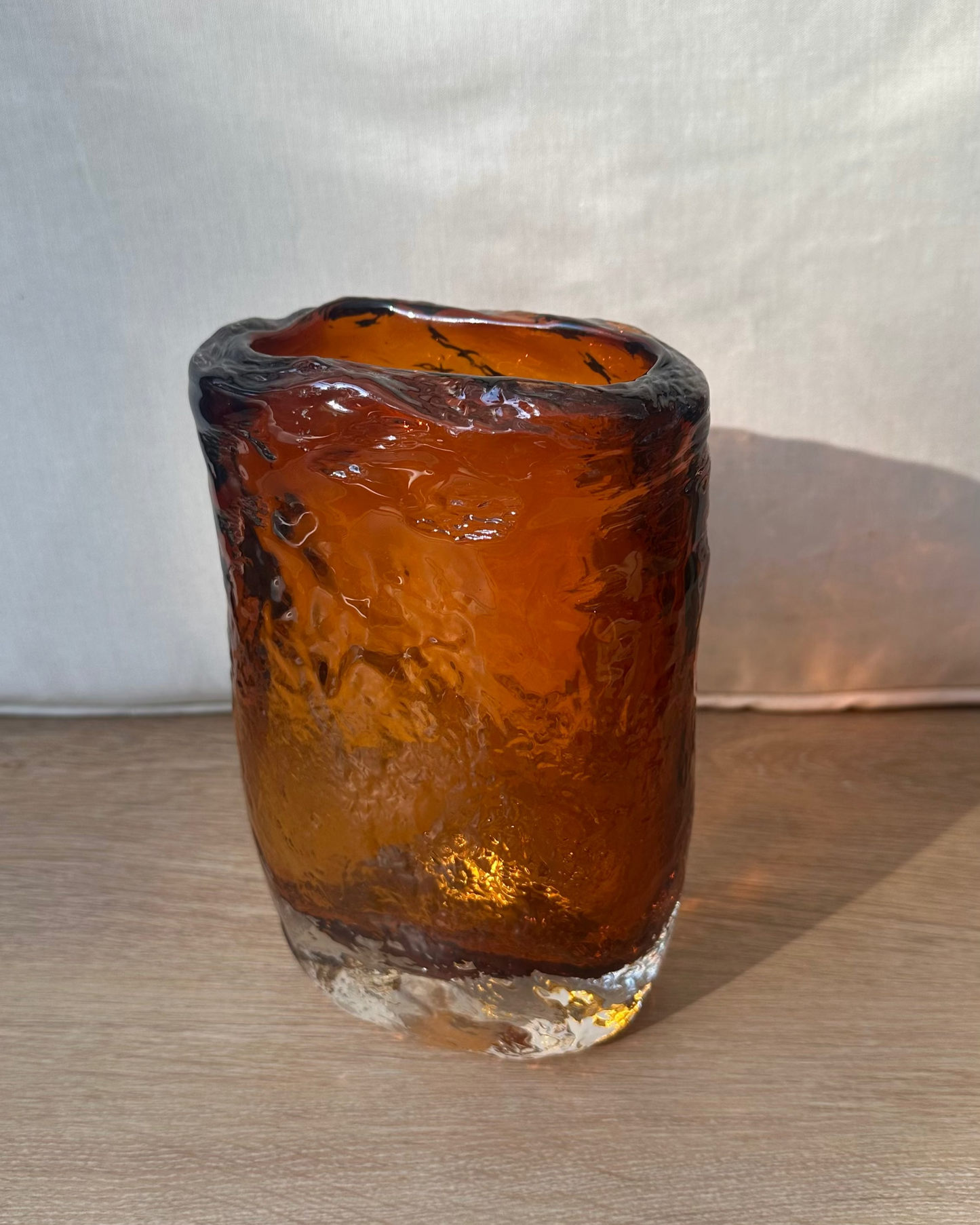 Molten amber glass vase