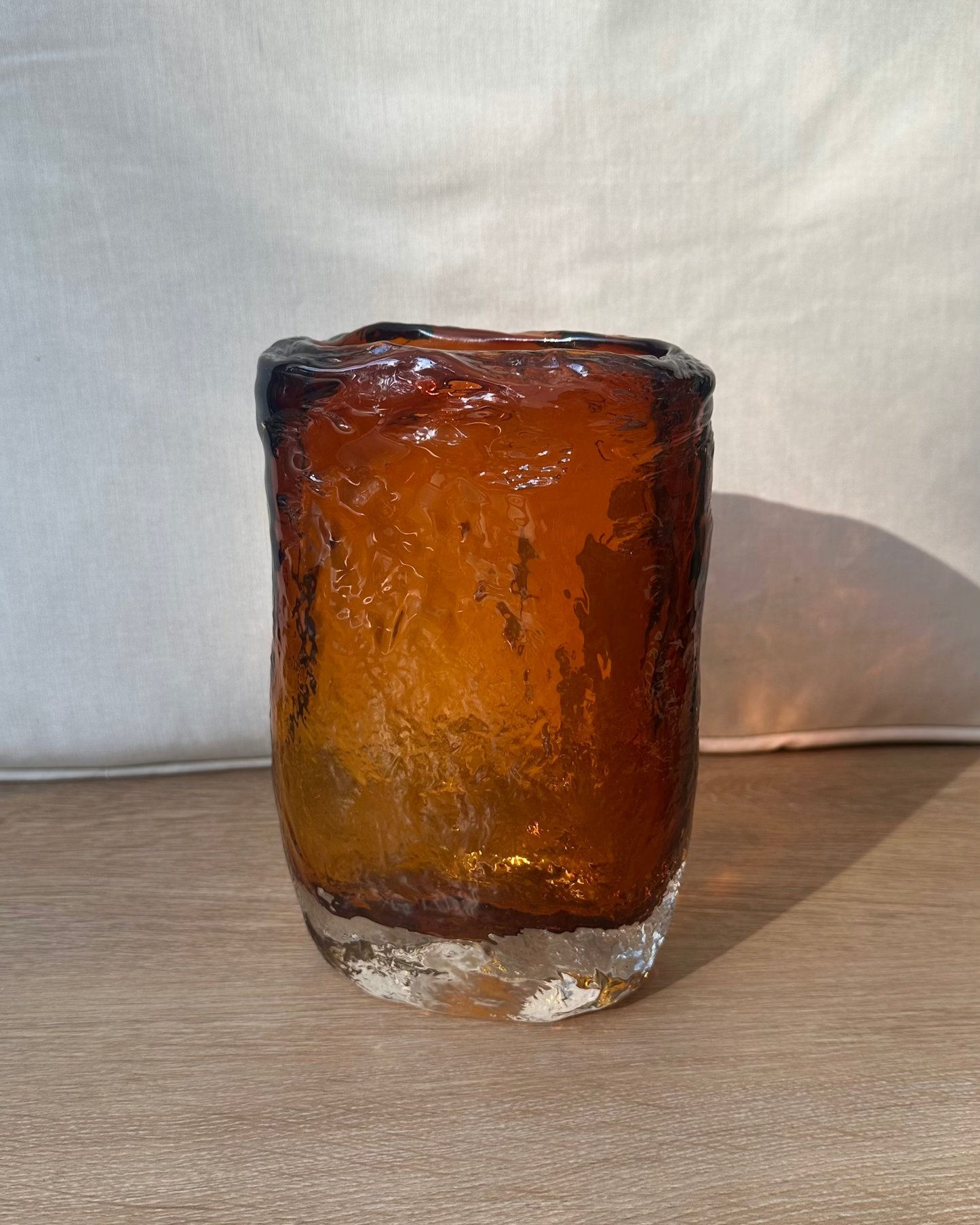 Molten amber glass vase